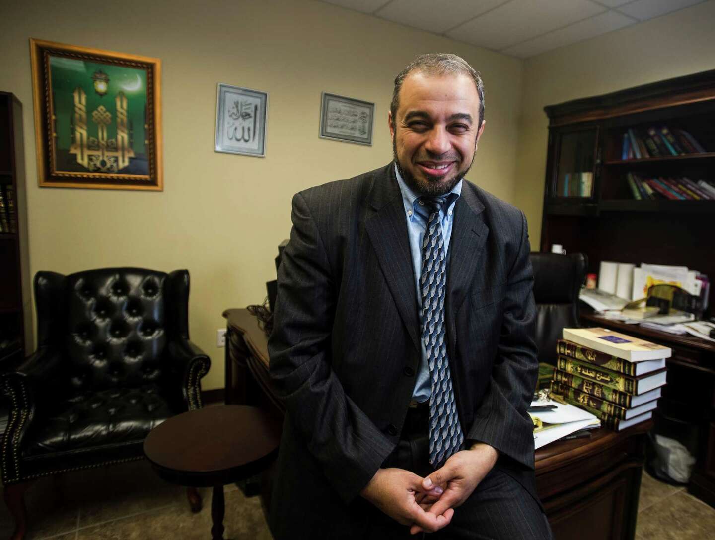 Nidal Alsayyed smiling in his study
